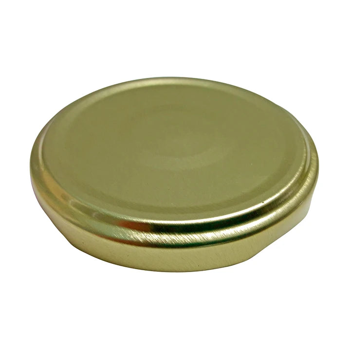 TAPA METÁLICA 66MM DORADA C/BOTÓN